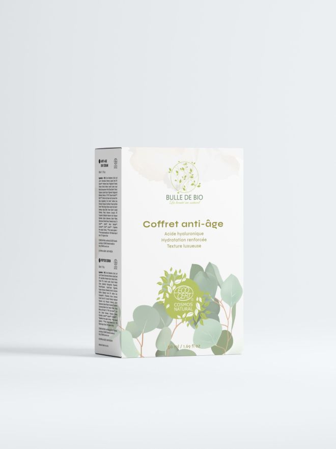 Pack Duo Performance Anti-Âge : coffret noir élégant avec sérum et crème anti-âge blancs aux détails dorés
