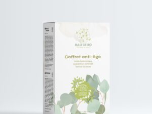 Pack Duo Performance Anti-Âge : coffret noir élégant avec sérum et crème anti-âge blancs aux détails dorés